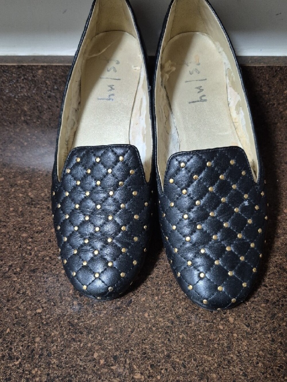 French Sole Black Quilted Loafers with Gold Stud Accents